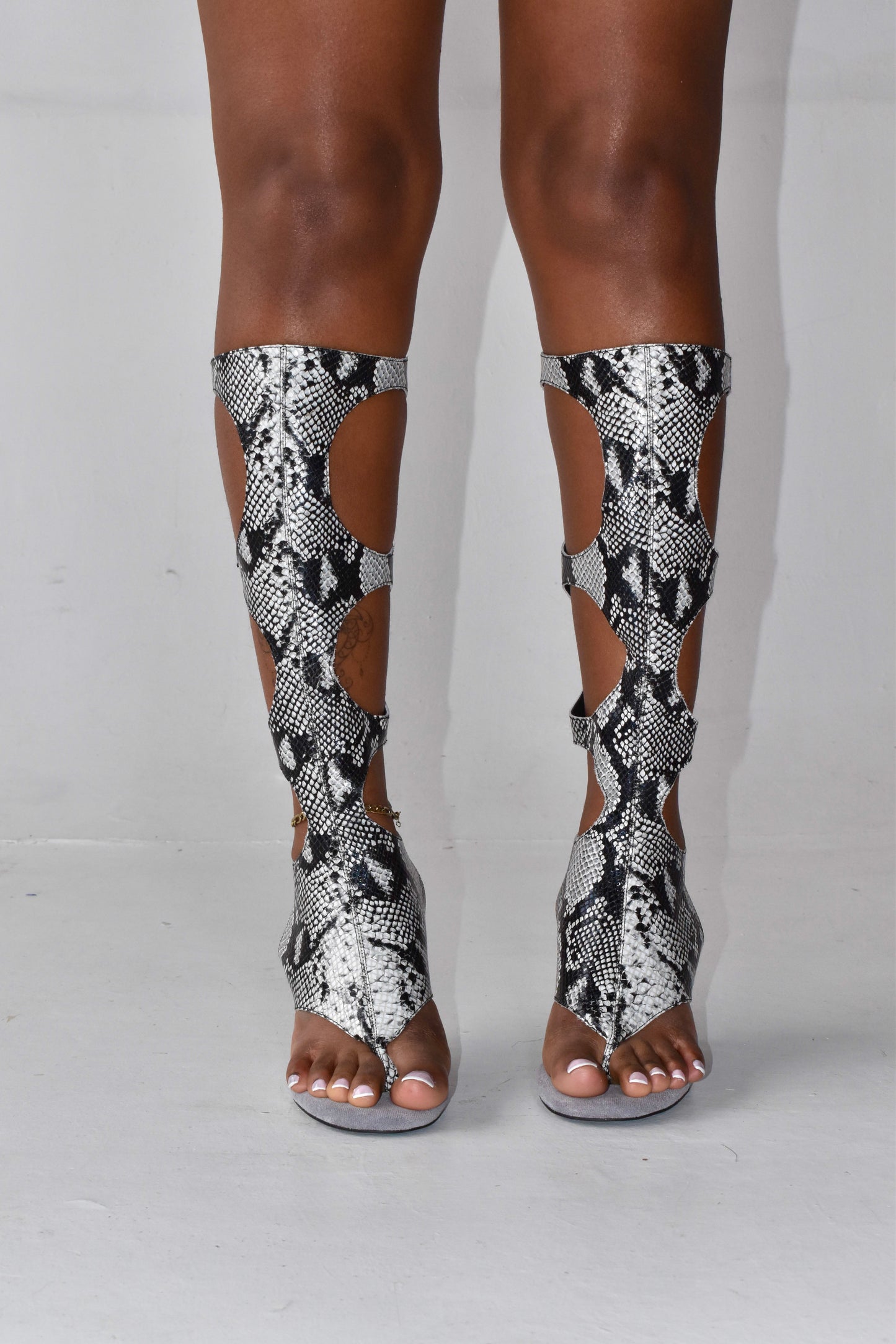 CLEOPATRA SNAKESKIN IOANNES THONG BOOTS
